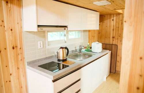 Tojungdo House | Explore Yesan Deoksan Charcoal Land Pension with Spa & Breakfast