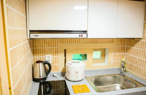 Tojungdo House | Explore Yesan Deoksan Charcoal Land Pension with Spa & Breakfast