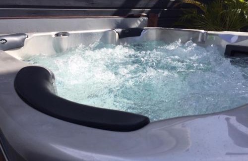 Saint-Andre Apartment | Relax at Ylang Résidence with Heated Pool and Hot Tub