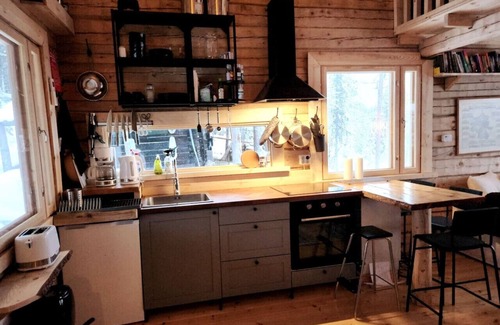 Kolari Cabin | Experience Ylläs: River Views, Sauna & BBQ Terrace Awaits