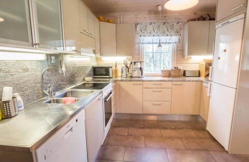 Yllas House | Experience Ylläs Siesta: Cozy Lake View Getaway with Spa