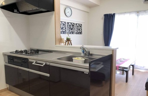 Tomigusuku Apartment | Modern YN14 Condominium near Airport with Family Amenities