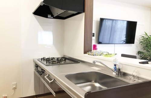 Tomigusuku Apartment | Relaxing YN32 Condominium Near Airport with Family Amenities