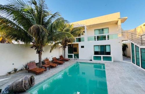 Chuburna Puerto Apartment | Inviting Yokoso Ocean View Beach Property with Pool & Restaurant