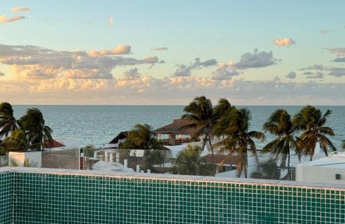 Chuburna Puerto Apartment | Inviting Yokoso Ocean View Beach Property with Pool & Restaurant