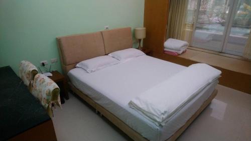 Taichang Village House | Explore Yongan Lohas B&B: Pet and Child Friendly Retreat