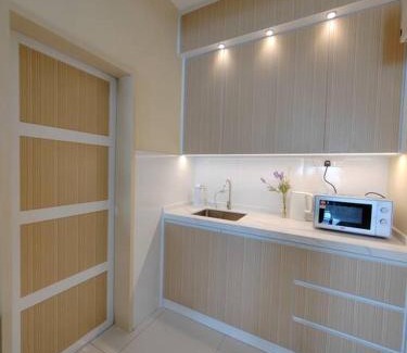 Kampung Sungai Raya Apartment | Spacious 3-Bedroom Unit with Pool and Netflix Access