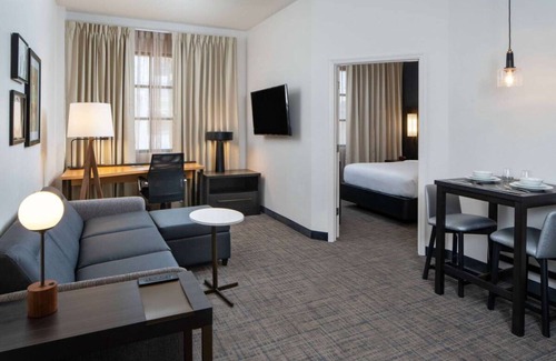 Arts/Warehouse District Hotel | Discover a Modern 2BR Suite with Pool and Breakfast Included!