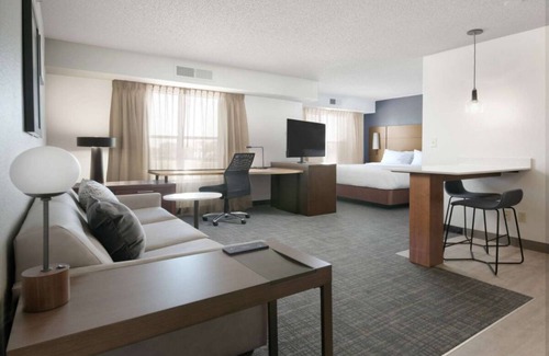 Fossil Creek Hotel | Discover Relaxing 2BR Suites with Pool & Free Breakfast
