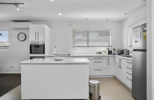 Wharewaka House | You little beauty - Wharewaka Beach Magic