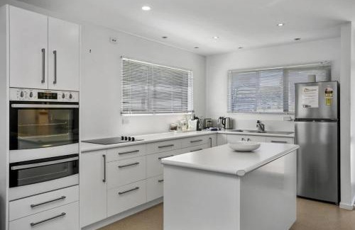 Wharewaka House | You little beauty - Wharewaka Beach Magic