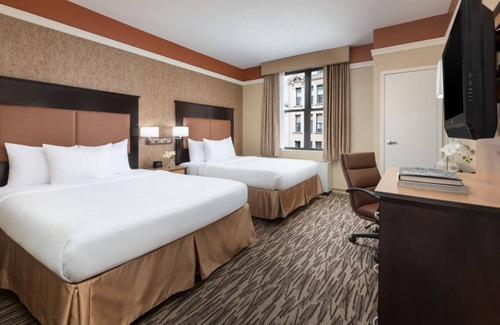 Koreatown Hotel | Comfortable Retreat: Pet-Friendly Units Near Flatiron Bldg