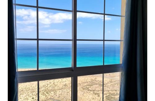 Pajara Apartment | Exceptional Ocean Window: 4-Star Getaway with Pool & Views