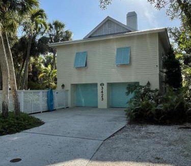 Bay Isle House | Unwind at Your Personal Resort: Pool, Tennis & Boating