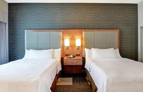 McNeil Hotel | Your Ultimate Resort Destination:Free Parking and Breakfast,Full Kitchen,Pool