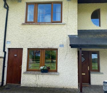 Tipperary House | Experience Your Very Own 19th Hole with Pool & Hot Tub