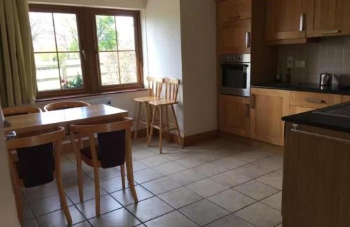 Tipperary House | Experience Your Very Own 19th Hole with Pool & Hot Tub