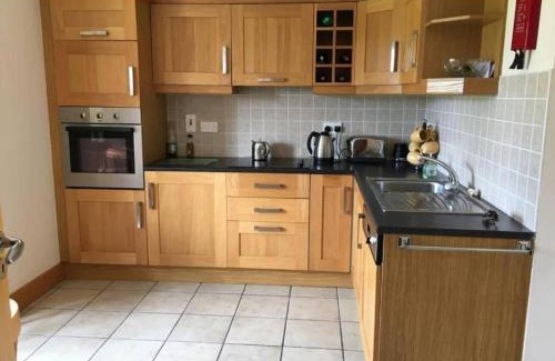 Tipperary House | Experience Your Very Own 19th Hole with Pool & Hot Tub