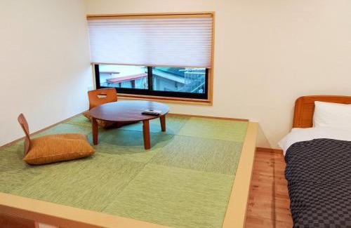 Geisei-mura Hotel | Relaxing Retreat at Yumeno Onsen with Hot Tub Access