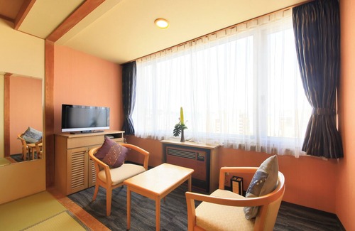 Toyako House | Discover Yutorelo Toyako: Relaxing Hot Tub & Family-Friendly