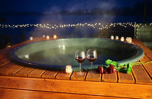 Ilawa House | Lakefront Retreat with Hot Tub & Pet-Friendly Comfort