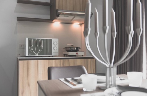 Nai Mueang Hotel | Inviting Zada Residence: Family-Friendly with Kitchen & More