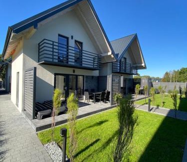 Debki Villa | Charming Zagroda Liliowa: Oceanfront Retreat with High Ratings