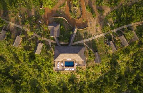 Larabanga Cabin | Discover Zaina Lodge: 4-Star Retreat with Pool & Breakfast