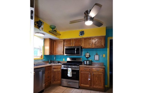 Ferguson House | Family-Friendly Retreat at Zaire's Palace with Lake Views