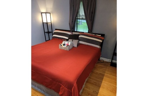 Ferguson House | Family-Friendly Retreat at Zaire's Palace with Lake Views