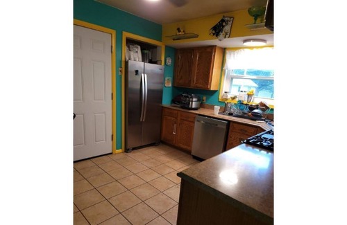 Ferguson House | Family-Friendly Retreat at Zaire's Palace with Lake Views