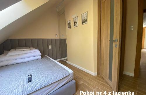 Nowe Guty Apartment | Guest Rated: Zakątek Śniardwy with Hot Tub and Kitchen