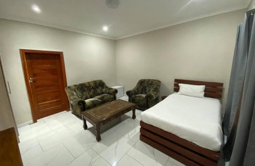 Livingstone Cabin | Discover Zambezi Ultima Lodge: Pool and Breakfast Awaits!