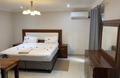 Livingstone Cabin | Discover Zambezi Ultima Lodge: Pool and Breakfast Awaits!