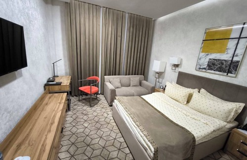 Navoiy Hotel | Discover Grand Hotel Zarafshan: Family-Friendly Retreat