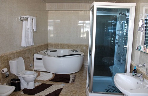 Navoiy Hotel | Discover Grand Hotel Zarafshan: Family-Friendly Retreat