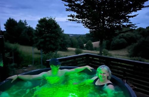 gmina Pawłow House | Relax at Our Retreat: Hot Tub, Sauna & Scenic Views