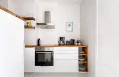 Alppiharju Apartment | Trendy Zen Apartment with Garden in Kallio Neighborhood