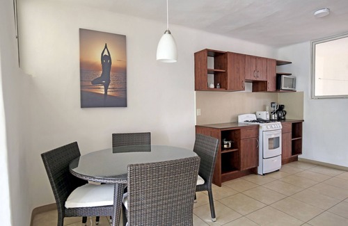 Diaz Ordaz Hotel | Relax at ZenHarmony Suites: Pool, Spa & Family-Friendly