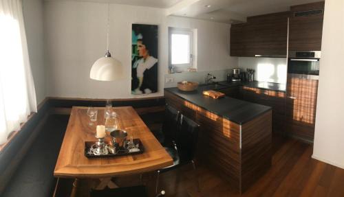 Lenzerheide Apartment | Modern Oceanfront Retreat in a Serene Atmosphere