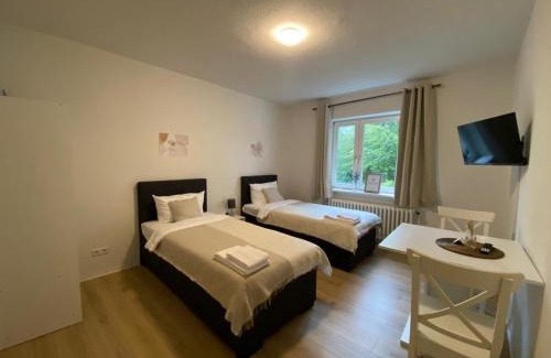 Neumuenster Apartment | Central 3-Room Apartment with Balcony - Family Friendly Stay