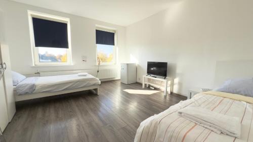 Neumuenster Apartment | Convenient Work&Stay Near City Center for Families