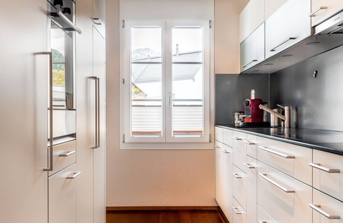 Andermatt Apartment | Discover Comfort at Zentrum Apartment with Spa & Hot Tub