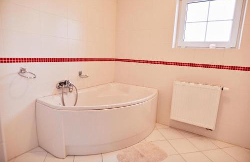 gmina Rzekun Hotel | Inviting Zielony Zakątek: Family-Friendly with Pool & Dining