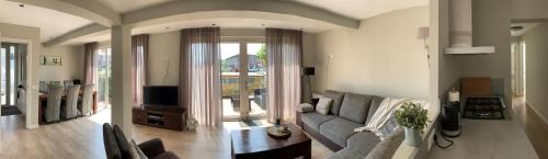 Municipality of Katwijk Apartment | Oceanfront Zilvermeeuw: Family-Friendly with Hot Tub & Views