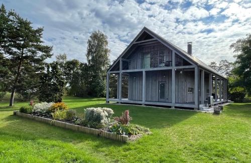 Berzciems Villa | Relax at Zušu Villa - Oceanfront with Exceptional Amenities