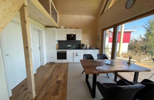 Horgenzell House | Experience Nature in a Two-Story Wood House with Views