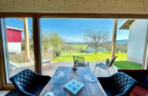 Horgenzell House | Experience Nature in a Two-Story Wood House with Views