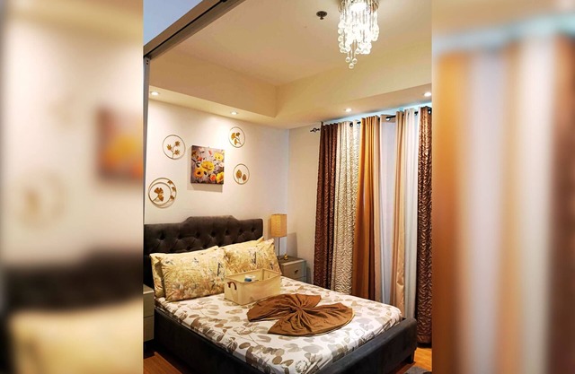 1BR Beach Pool Stay at Azure | Family-Friendly Near SM Bicutan