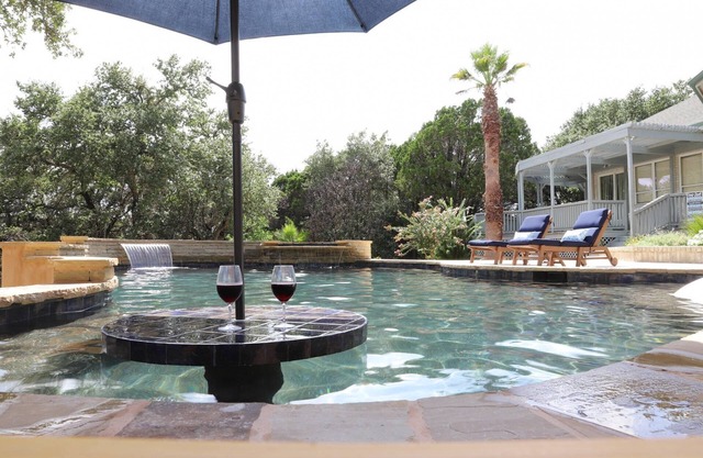 2 Master Suites, Private Pool with Hot Tub, Wrap-around Porch, Sun Room, Outdoor Kitchen